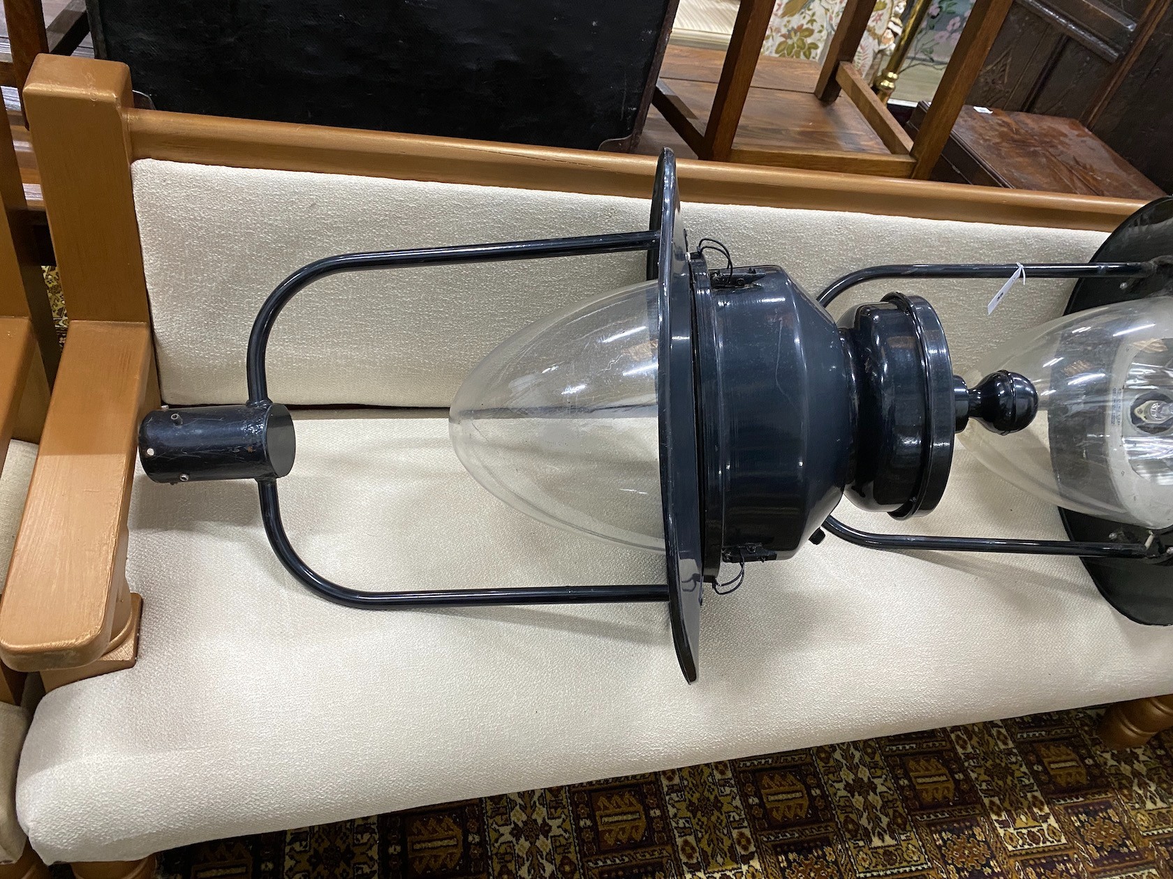 A pair of industrial style lanterns with perspex shades, height 108cm